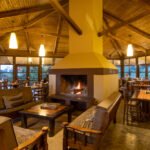 Rhino Lodge dining area with fireplace